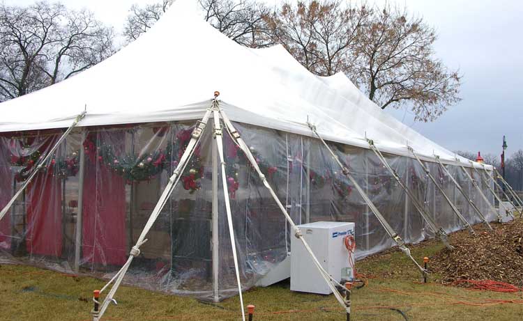 A Premier portable forced air heater outside an event tent.